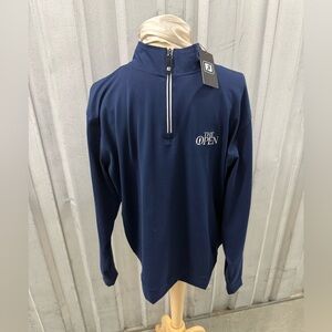The Open FootJoy Navy Quarter-Zip Pullover with NBC Sports logo on the sleeve